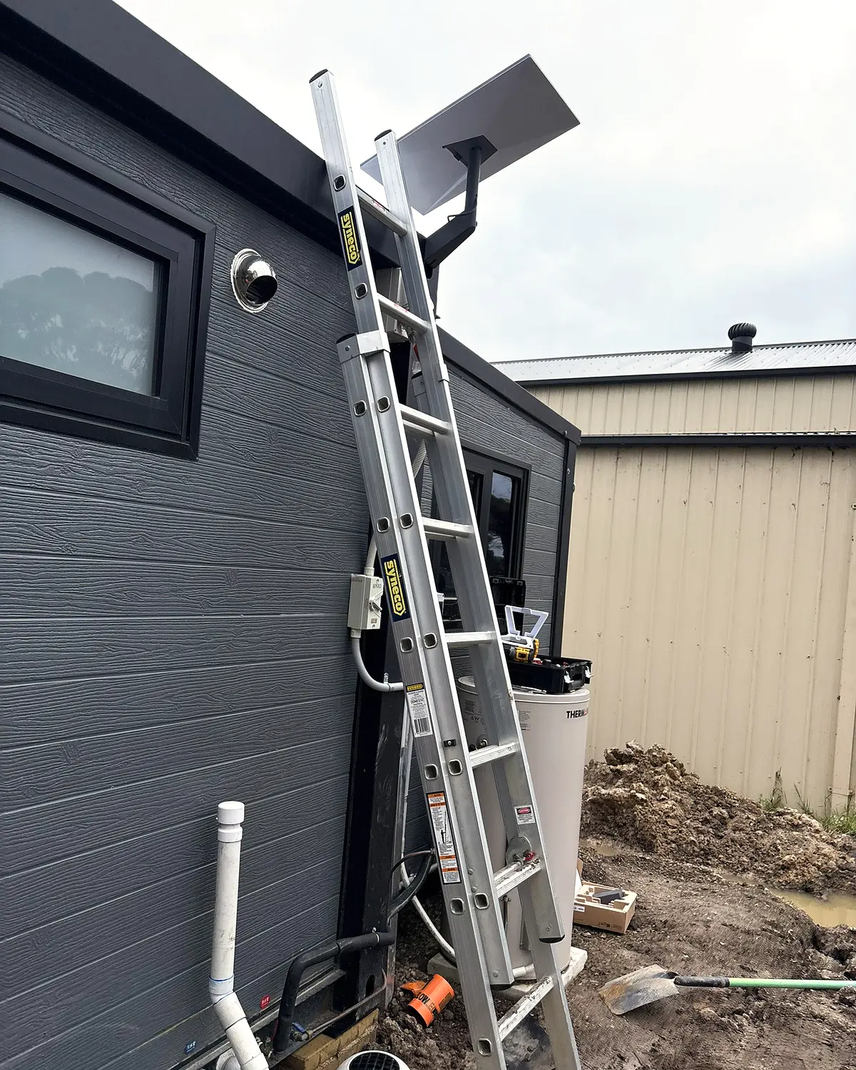 Starlink Standard dish on a wall mount on a new build in Devon Meadows.