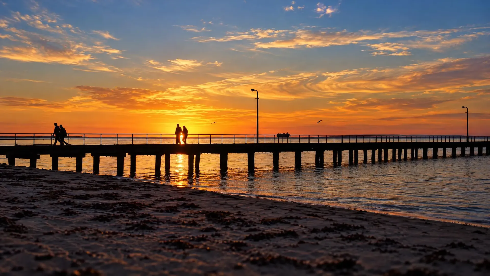 Rosebud pier and lights at sunset.