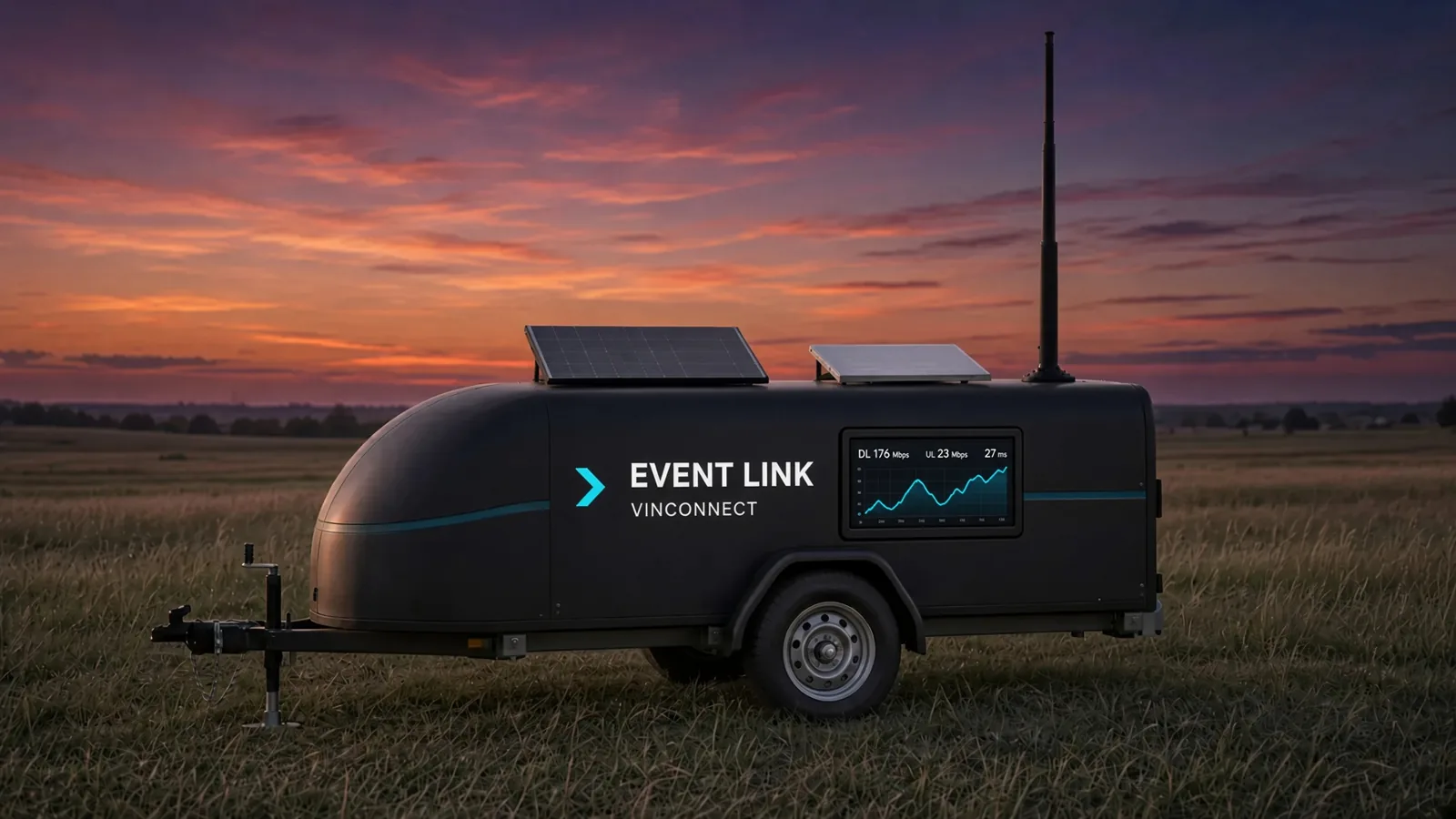 The branded mid-size Event Link trailer at dusk with the mast up.