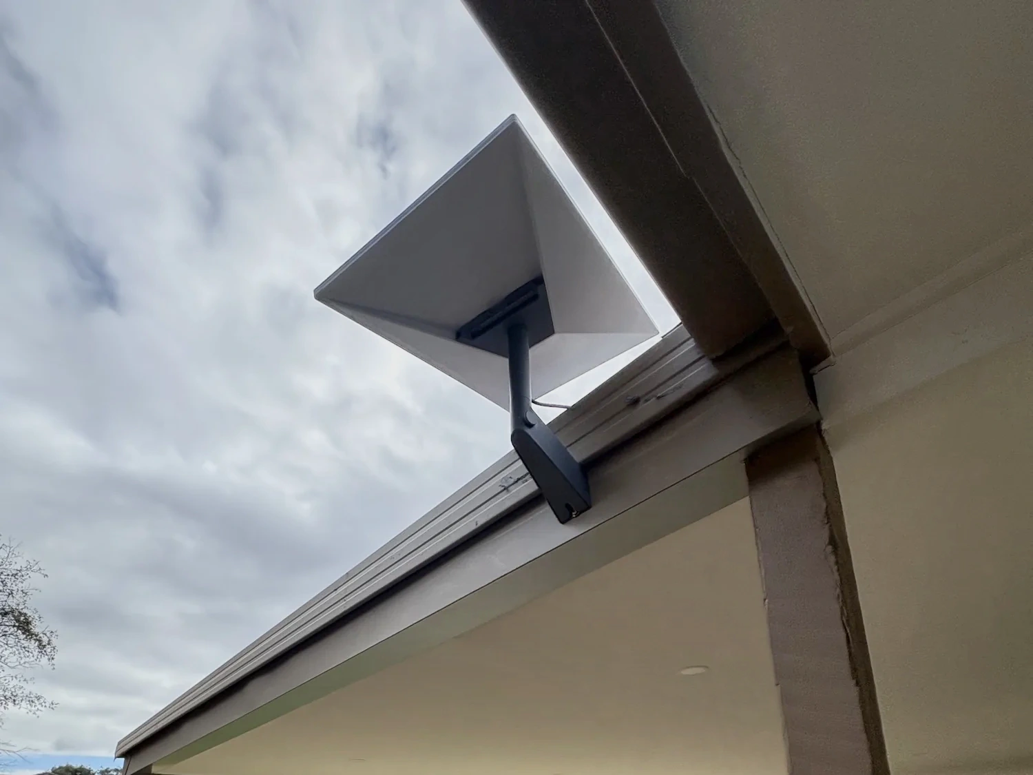 Starlink Standard dish on a metal roof.